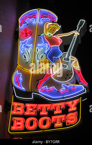Tennessee Nashville,Music City USA,downtown,Lower Broadway,strip,neon light,sign,Betty Boots,western store,cowboy boot,shopping shopper shoppers shop Stock Photo
