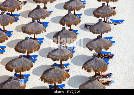 Parasols on the beach in Cancun, Mexico Stock Photo