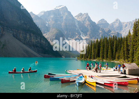 Canoes on Moraine Lake, Near Lake Louise, in Banff National Park in the Rocky Mountains, Alberta, Canada Stock Photo