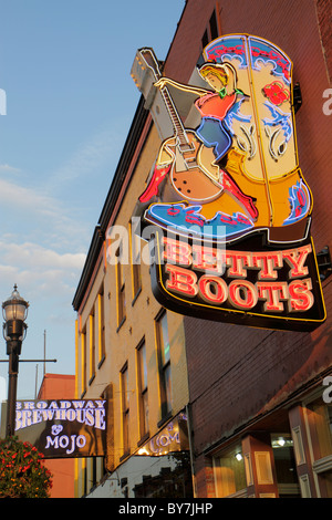 Tennessee Nashville,Music City USA,downtown,Lower Broadway,neon light,sign,Betty Boots,western store,cowboy boot,shopping shopper shoppers shop shops Stock Photo