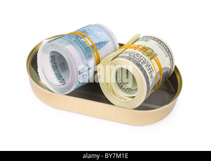 rolled bundles of US 100 dollars and russian 1000 rubles bills, in an oval can, clipping path Stock Photo