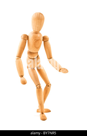 running wooden mannequin isolated on white background close up Stock Photo