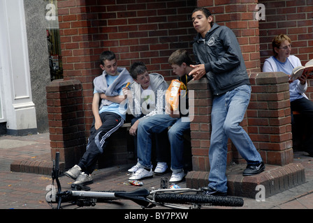 youth hanging around shopping center centre in Deal  UK Stock Photo