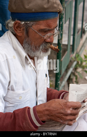 Cuba, Havana. Bearded Man Chewing on a Cigar. Stock Photo