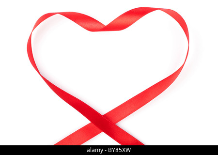 Red ribbon curled in heart shape isolated on white background Stock Photo