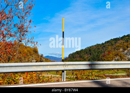 guard rail with the background and mountains enchanted forest Stock Photo