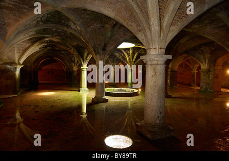 Columns and reflected skylight in underground Portuguese cistern underground water in the old city of El Jadida Morocco Stock Photo