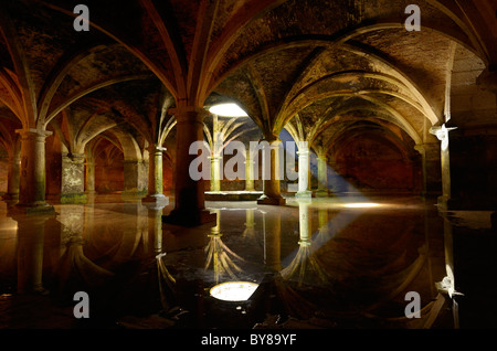 Shaft of light from skylight in underground Portuguese cistern ancient armory water reflection in the old city of El Jadida Morocco Stock Photo