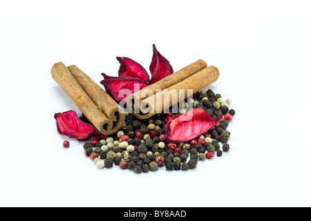 Closeup of mixed pepper and cinnamon sticks Stock Photo