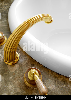 Gold Faucet & Handles Bathtub in Bathroom Stock Photo