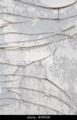 white and gray wall with old peeling paint Stock Photo