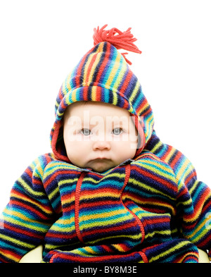 Baby in brightly coloured outfit Stock Photo