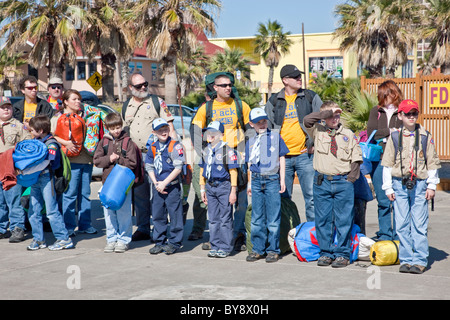 Boy & Cub Scouts with leaders, waiting to board USS Lexington, Texas Stock Photo
