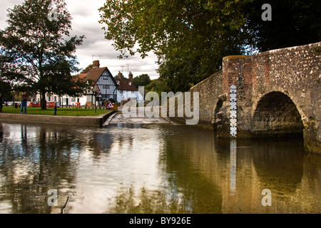 The ford at Eynesford with its old stone bridge reflecting in the water Stock Photo