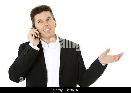 Attractive middle-aged man making a phone call. All on white background. Stock Photo