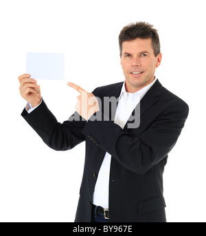Attractive middle-aged man holding business card. All on white background. Stock Photo