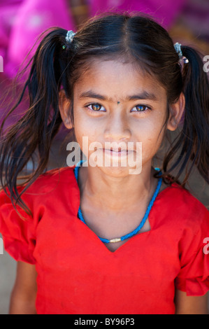 Happy young poor lower caste Indian street girl smiling. Andhra Pradesh, India Stock Photo