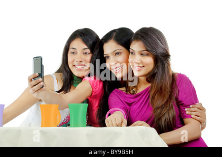 Friends taking a picture of themselves Stock Photo