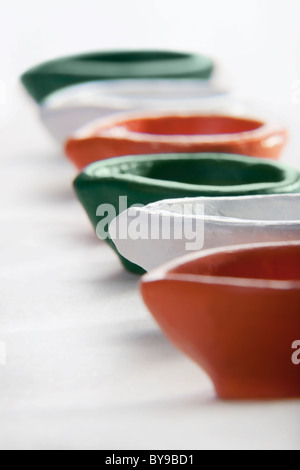 Different coloured diyas Stock Photo