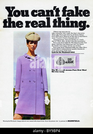 1960s colour WOOLMARK advertisement for coat in pure new wool in women's fashion magazine circa 1967 Stock Photo