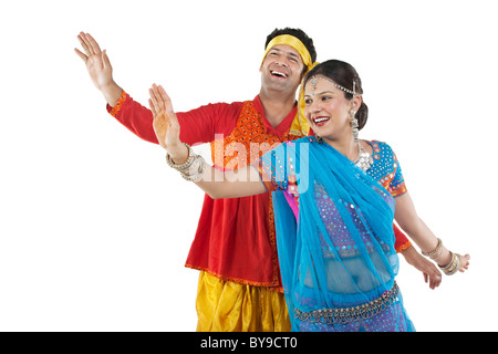 Gujarati couple dancing Stock Photo