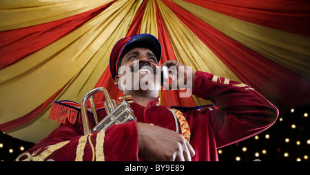 Bandmaster talking on a mobile phone Stock Photo