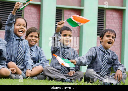 School kids holding the Indian flag Stock Photo