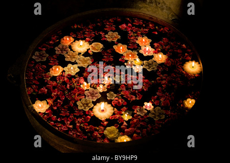 Diyas floating in an urn Stock Photo