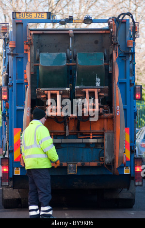 Refuse collectors at work on a Coventry street. West Midlands, England. Stock Photo