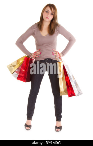 bored shopper woman with bags isolated on white Stock Photo