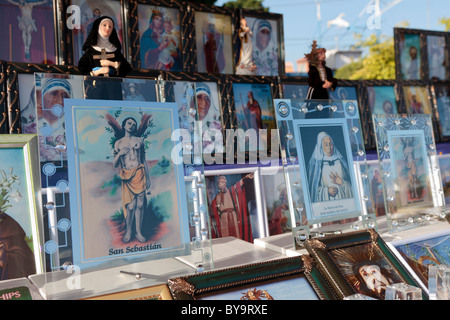 Stall selling religious pictures at the Fiestas de San Sebastian in Adeje, Tenerife, Canary Islands, Spain Stock Photo
