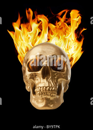 Golden skull with blazing fire