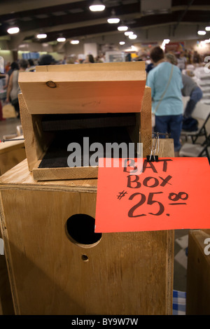 Items for sale at a bird expo. Stock Photo