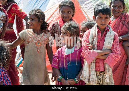 Poor indian lower caste girls outside their bender / tent / shelter ...