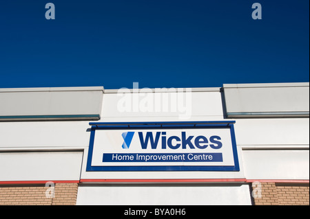 WICKES home improvement centre sign under blue sky in Newport South Wales UK Stock Photo