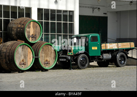 Shipping building, beer transport with historic barrels, Praga L truck from 1930, Pilsner Urquell brewery, Pilsen, Bohemia Stock Photo