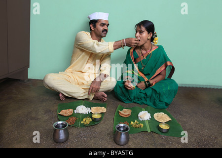 Maharashtrian couple having lunch Stock Photo