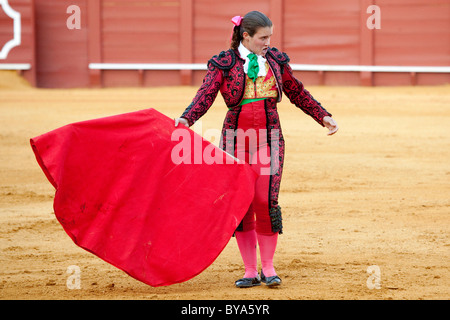 Female Torero or torera, matador with bull, Plaza de Toros de la Maestranza bull ring, Seville, Andalusia, Spain, Europe Stock Photo