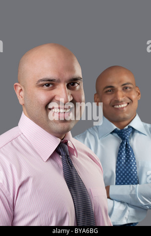 Portrait of two bald executives Stock Photo