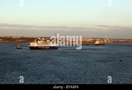 Irish Ferries passenger ship Oscar Wilde departing from Pembroke Dock, as seen from Angle, Pembrokeshire Stock Photo