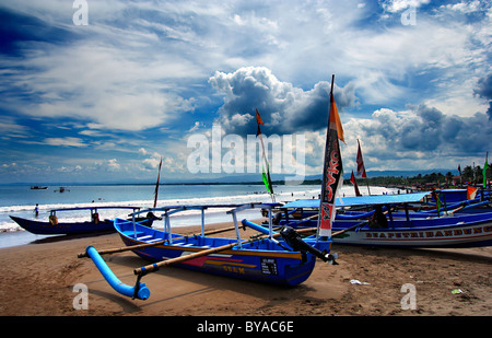 Traditional fishing boats, in beautiful Pangandaran village, on the south coast of Java island (West Java), Indonesia Stock Photo