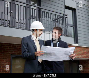 Developer talking to architect Stock Photo