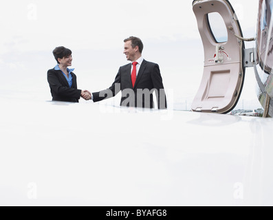 Business Executives shaking hands Stock Photo