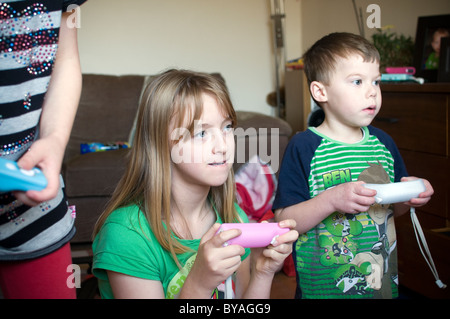 Children playing on Nintendo wii, game, computer, games, children, child, childhood,Bedroom Bedrooms Best Friend Best Friends Stock Photo