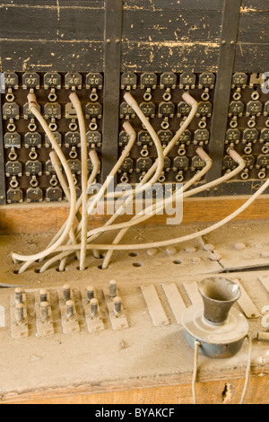 An early 20th century telephone switchboard containing 50 double lines ...