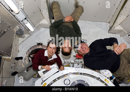 Astronauts inside International Space Station Mission 131 12 April 2010 Stock Photo