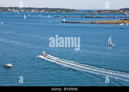 Sailboats and private power boats in Casco Bay near port of Portland, Maine Stock Photo