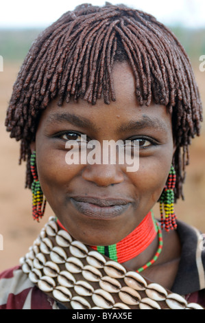 Woman from the Hamar tribe being flogged in the initiation ritual 