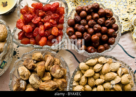 Dried fruits served for guest in private houses in Central Asia. Stock Photo