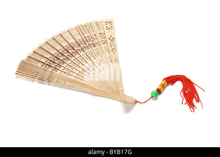 Chinese wooden folding fan on white background Stock Photo
